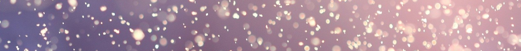 Schnellfall, durch die Flocken scheint die Sonne durch.